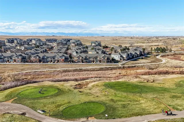 a view of a city with an ocean view