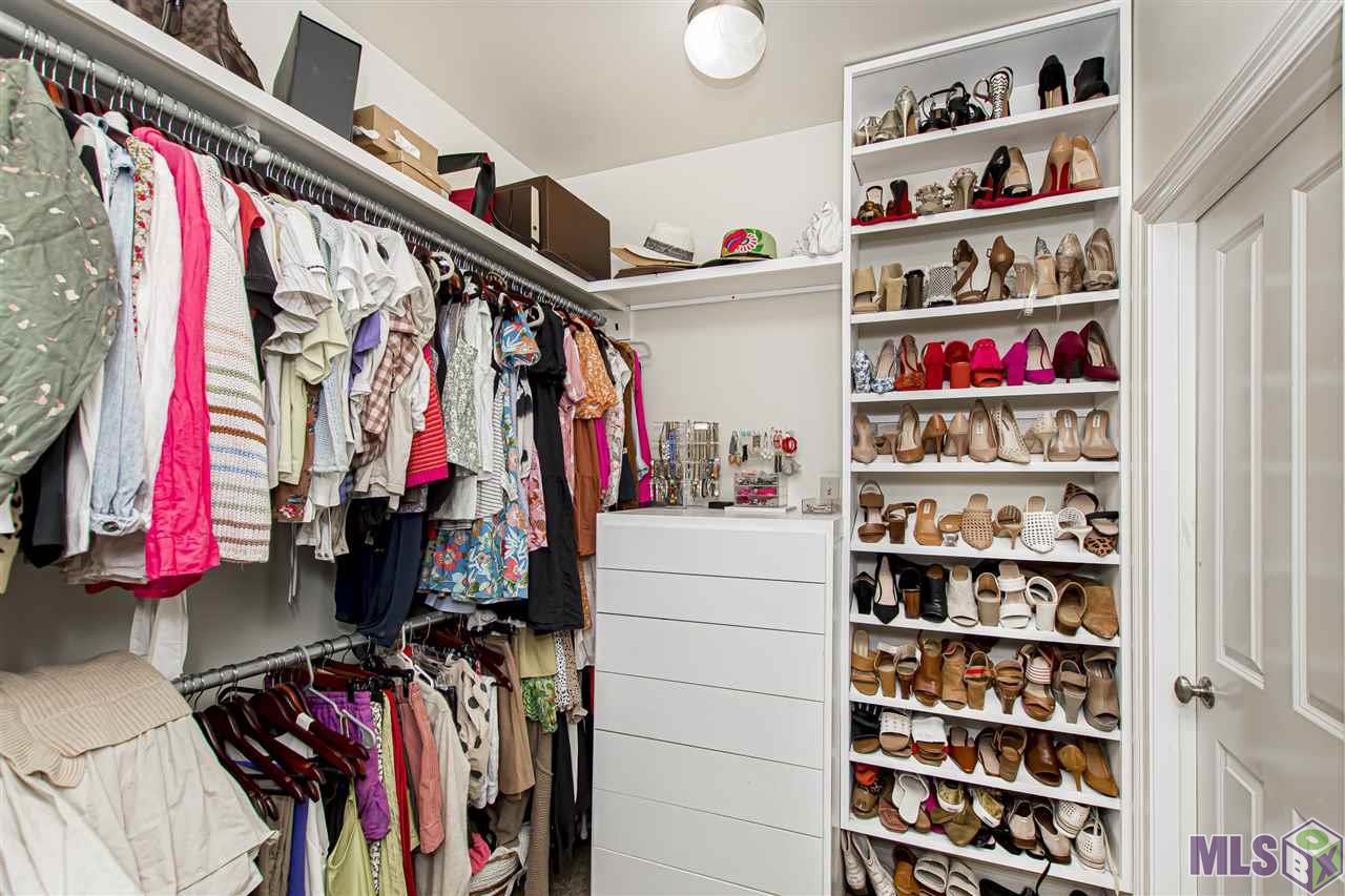 6168 Ridge Way Avenue Baton Rouge, LA 70817 - Photo 25 of 38 Master Closet with built-in shelving/storage