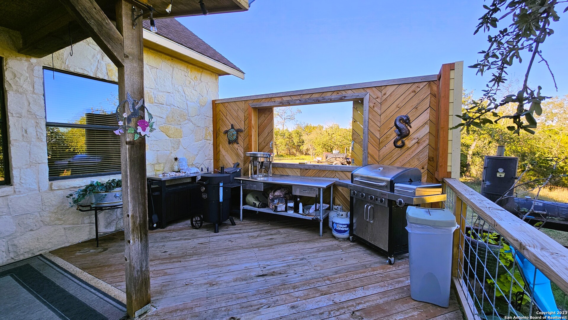 3245 Fm 470 Bandera, TX 78003 - Photo 13 of 58 a living room with furniture and a flat screen tv