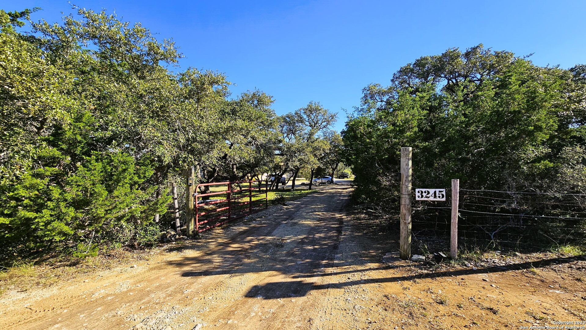 3245 Fm 470 Bandera, TX 78003 - Photo 21 of 58 a view of a house with a yard