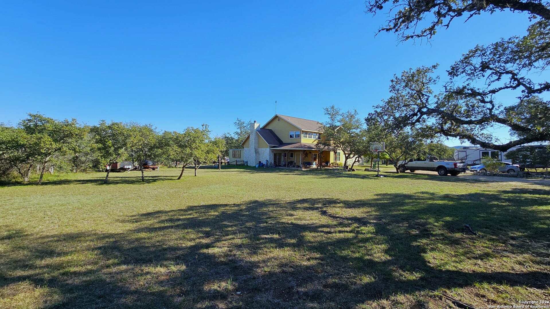 3245 Fm 470 Bandera, TX 78003 - Photo 22 of 58 a view of a house with a big yard