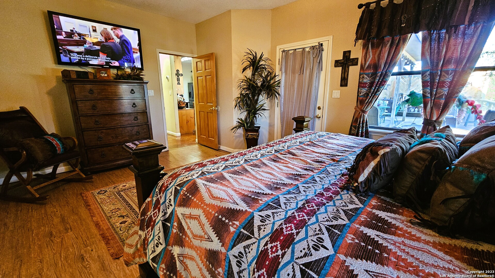 3245 Fm 470 Bandera, TX 78003 - Photo 44 of 58 a bedroom with a bed and a flat screen tv