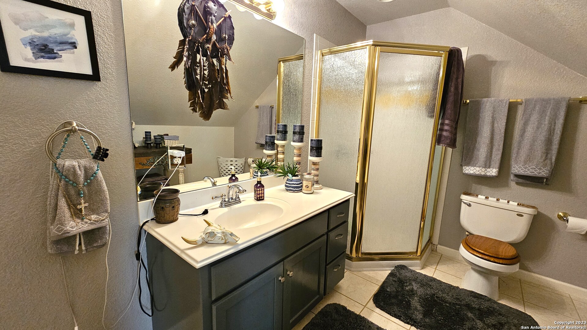 3245 Fm 470 Bandera, TX 78003 - Photo 51 of 58 a bathroom with a sink a toilet and mirror