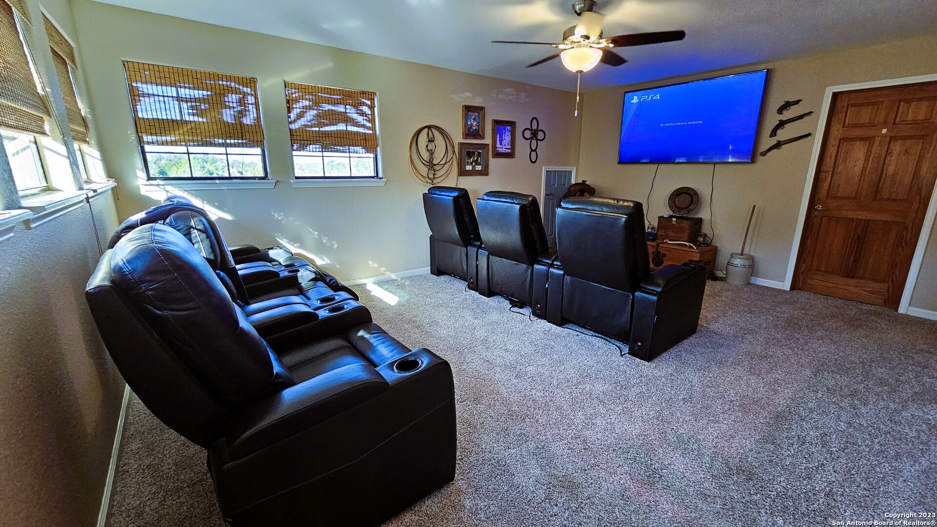 3245 Fm 470 Bandera, TX 78003 - Photo 52 of 58 a living room with furniture and a bookshelf