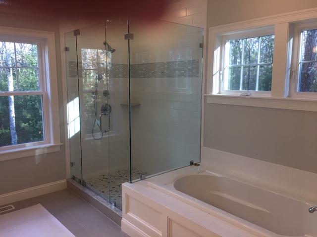 17 Alma Road Mashpee, MA 02649 - Photo 17 of 21 a bathroom with a bathtub and a shower