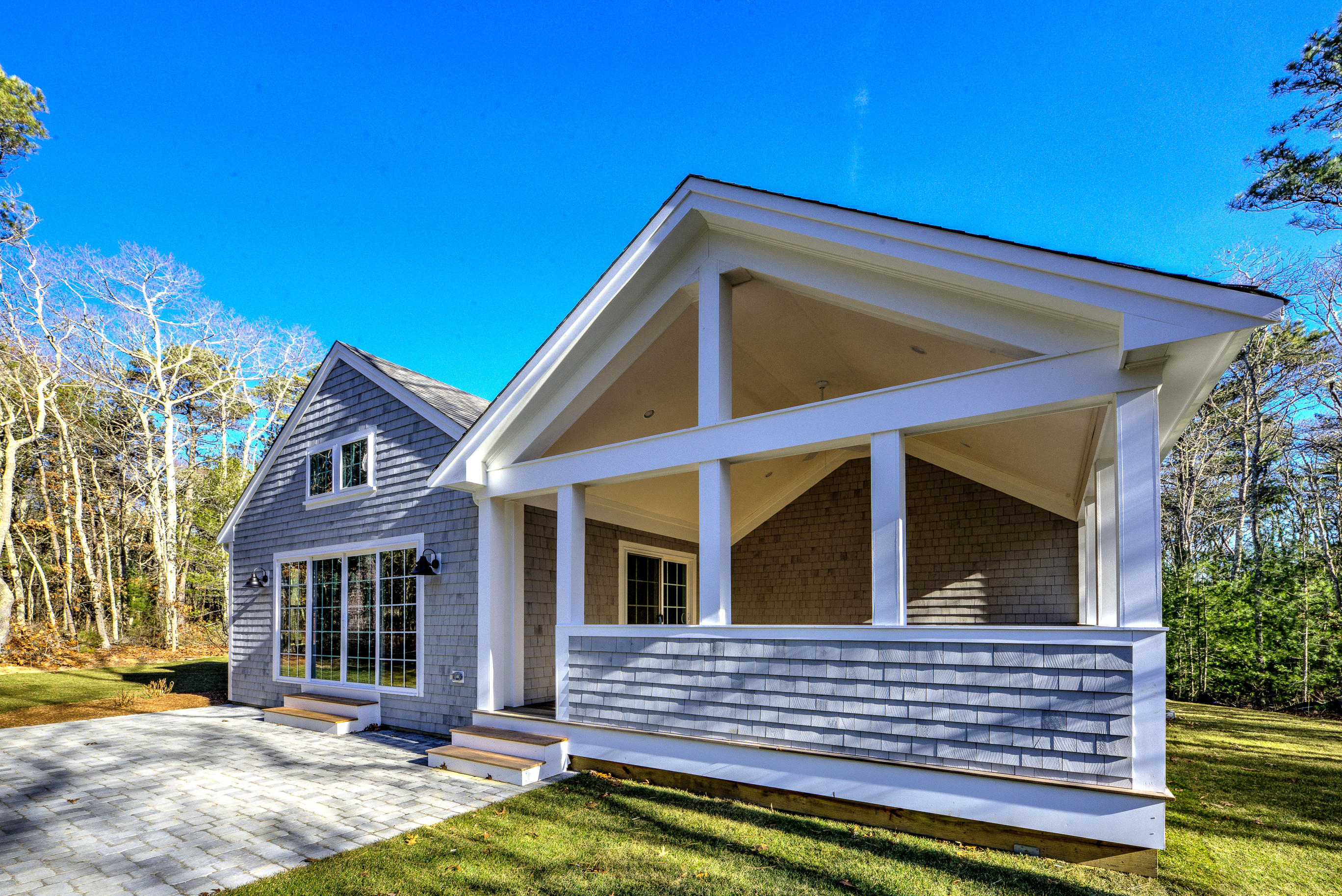 17 Alma Road Mashpee, MA 02649 - Photo 4 of 21 a view of house with a small yard and wooden fence