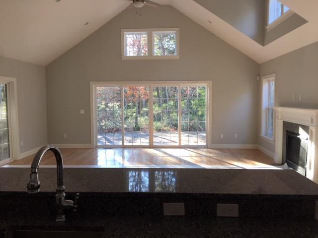 17 Alma Road Mashpee, MA 02649 - Photo 8 of 21 a living room with furniture and a floor to ceiling window