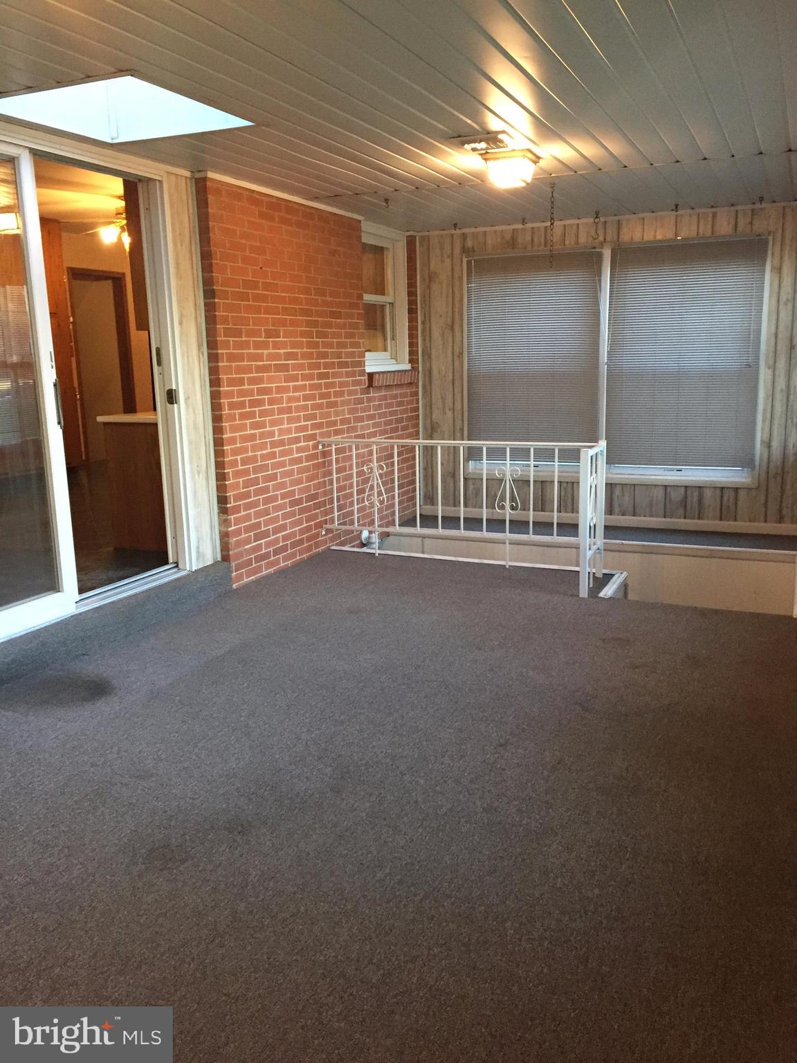 1405 North River Road Halifax, PA 17032 - Photo 11 of 28 Sunroom Leads to Lower Level