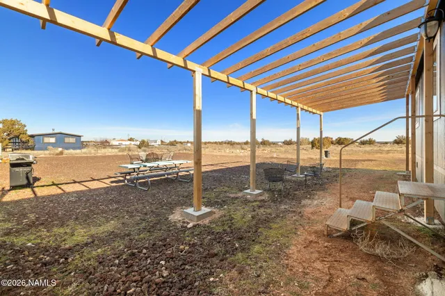 a view of outdoor space with seating area