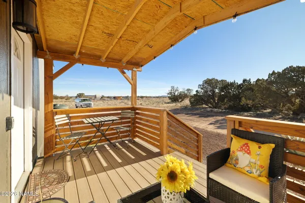a view of a yard with an outdoor space