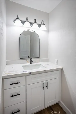 a living room with furniture and floor to ceiling windows