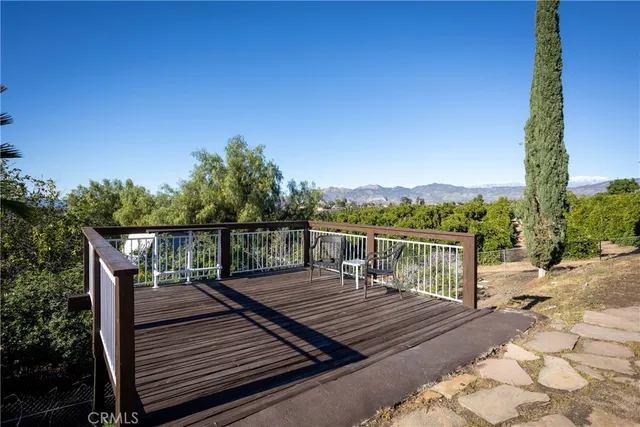 a house with trees in the background