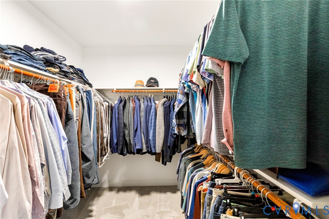 14436 Overlook Ridge Lane Beaverdam, VA 23015 - Photo 33 of 82 a view of walk in closet with clothes and shoes