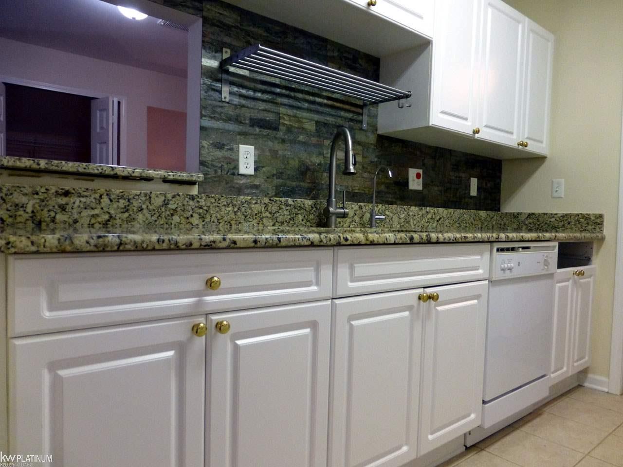 3643 Oakmonte Boulevard Rochester, MI 48306 - Photo 7 of 47 Surprising amount of cabinetry and storage space