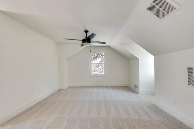 a view of empty room with windows