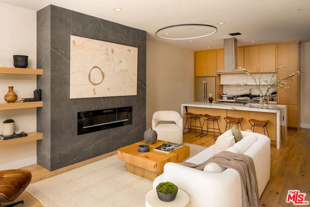 512 Rustic Drive Los Angeles, CA 90065 - Photo 11 of 53 a living room with furniture and a fireplace