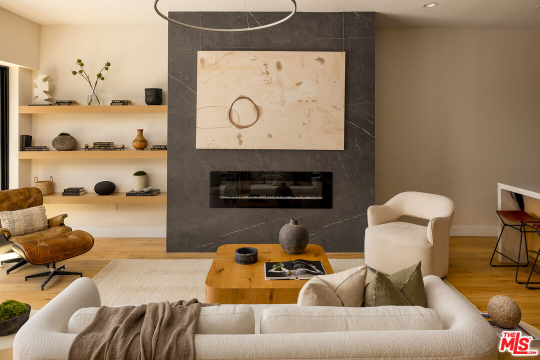 512 Rustic Drive Los Angeles, CA 90065 - Photo 12 of 53 a living room with furniture and a fireplace