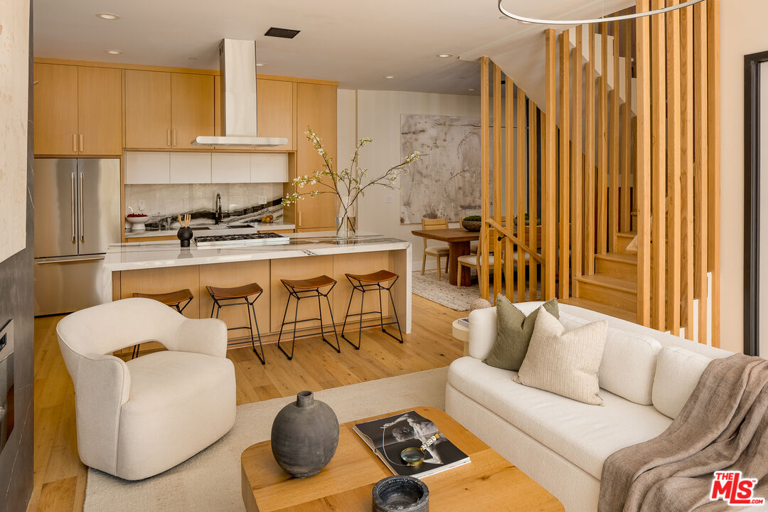 512 Rustic Drive Los Angeles, CA 90065 - Photo 13 of 53 a living room with furniture kitchen view and a large window