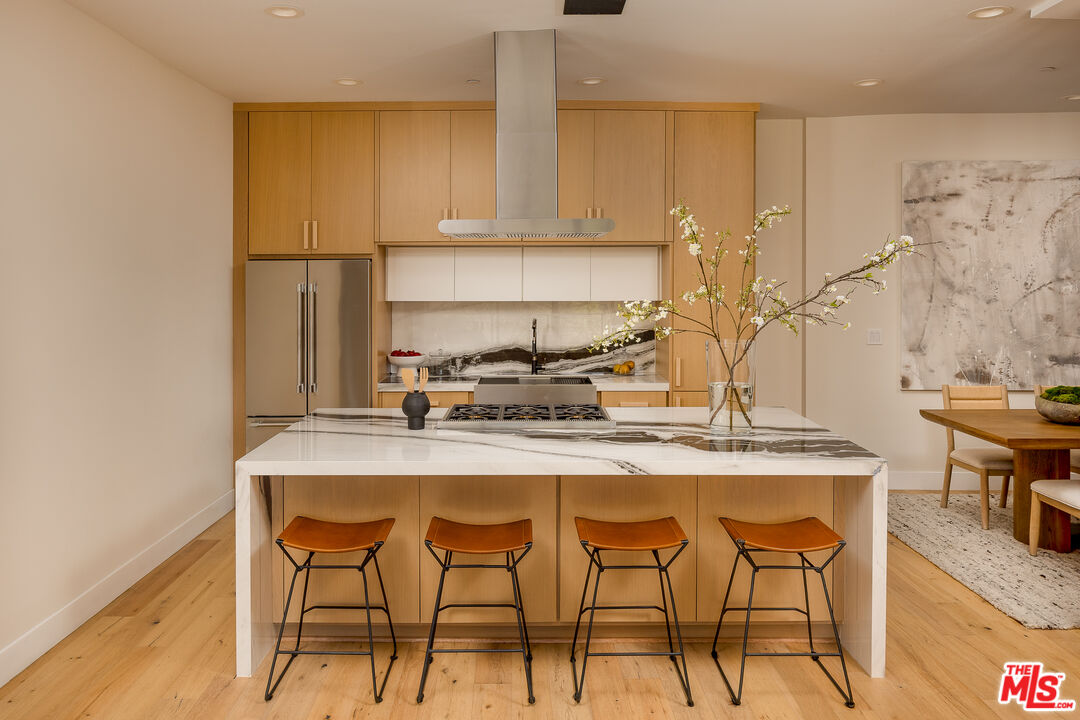 512 Rustic Drive Los Angeles, CA 90065 - Photo 14 of 53 a kitchen with a table chairs stove and cabinets