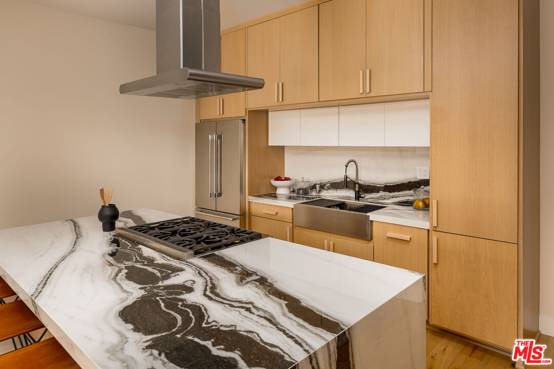 512 Rustic Drive Los Angeles, CA 90065 - Photo 15 of 53 a kitchen with a sink a stove and white cabinets