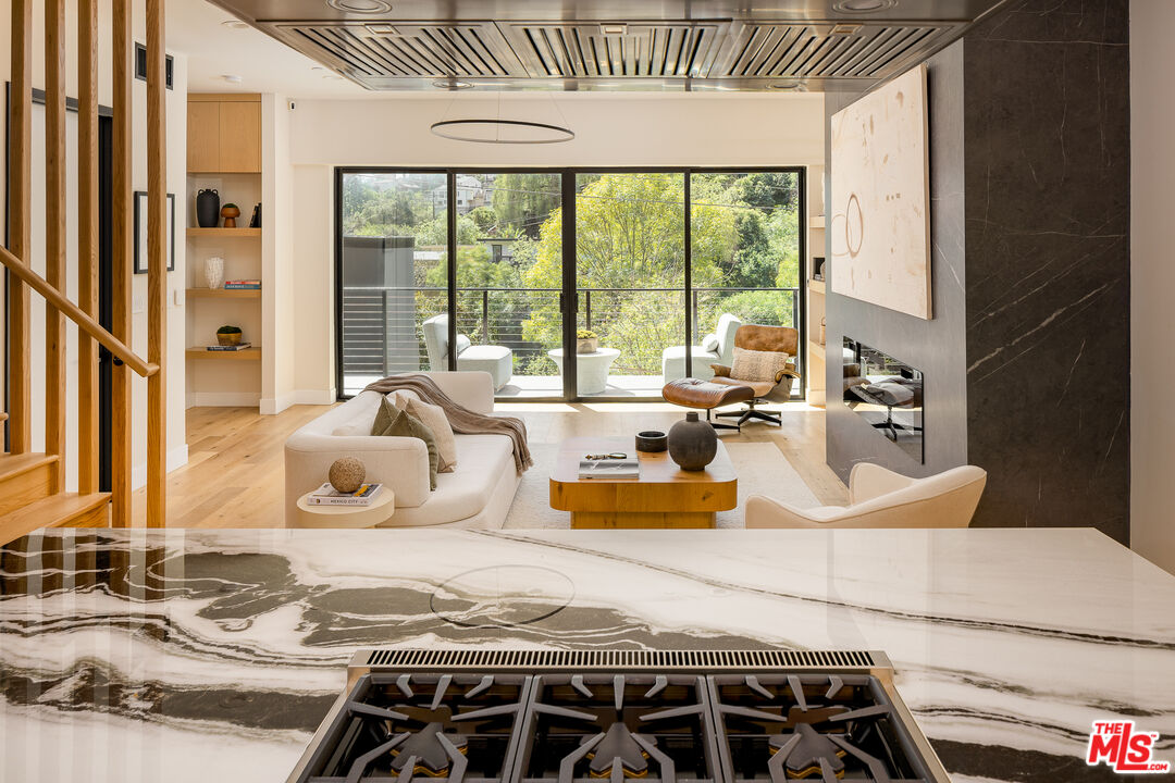 512 Rustic Drive Los Angeles, CA 90065 - Photo 17 of 53 a bedroom with furniture and large windows