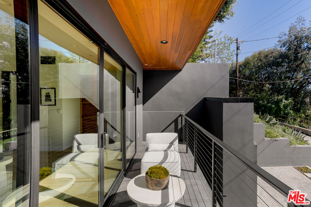 512 Rustic Drive Los Angeles, CA 90065 - Photo 18 of 53 a balcony with chairs