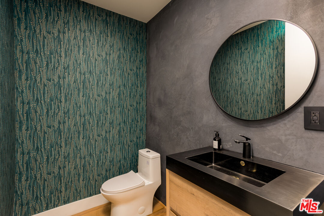 512 Rustic Drive Los Angeles, CA 90065 - Photo 19 of 53 a bathroom with a toilet and a sink