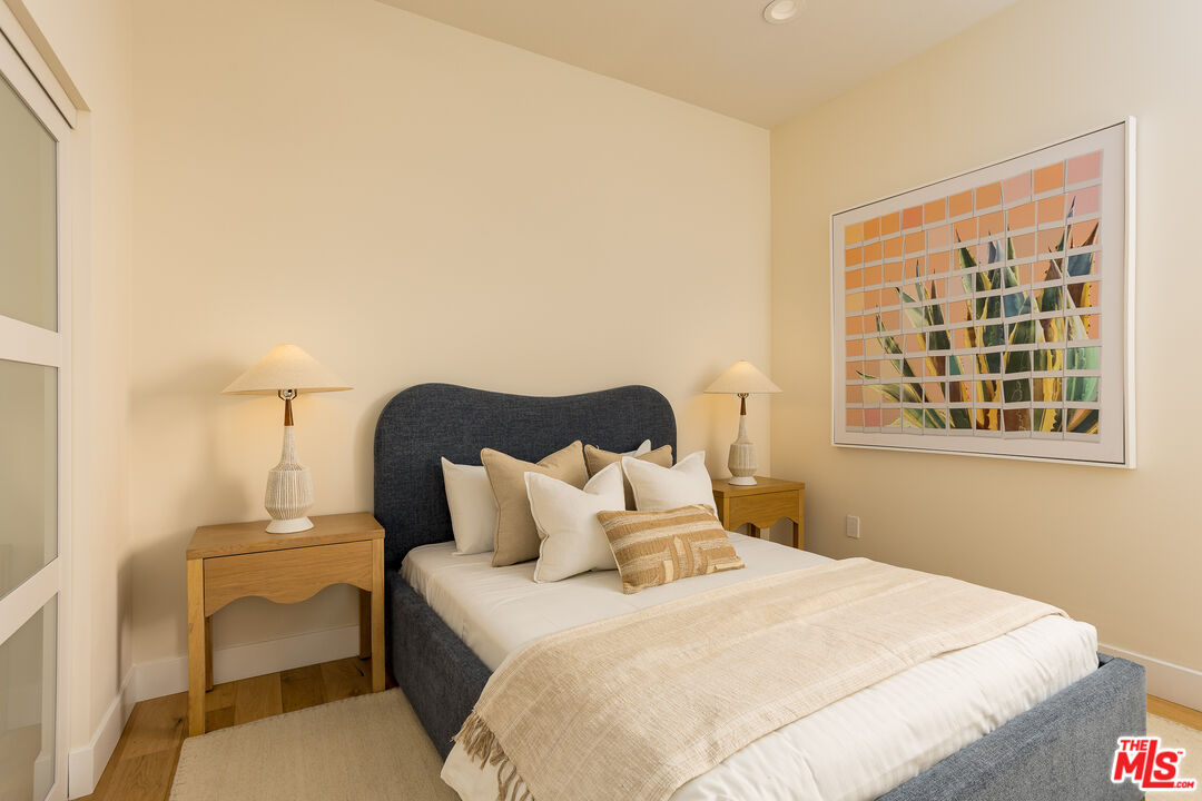 512 Rustic Drive Los Angeles, CA 90065 - Photo 21 of 53 a bedroom with a bed and a window