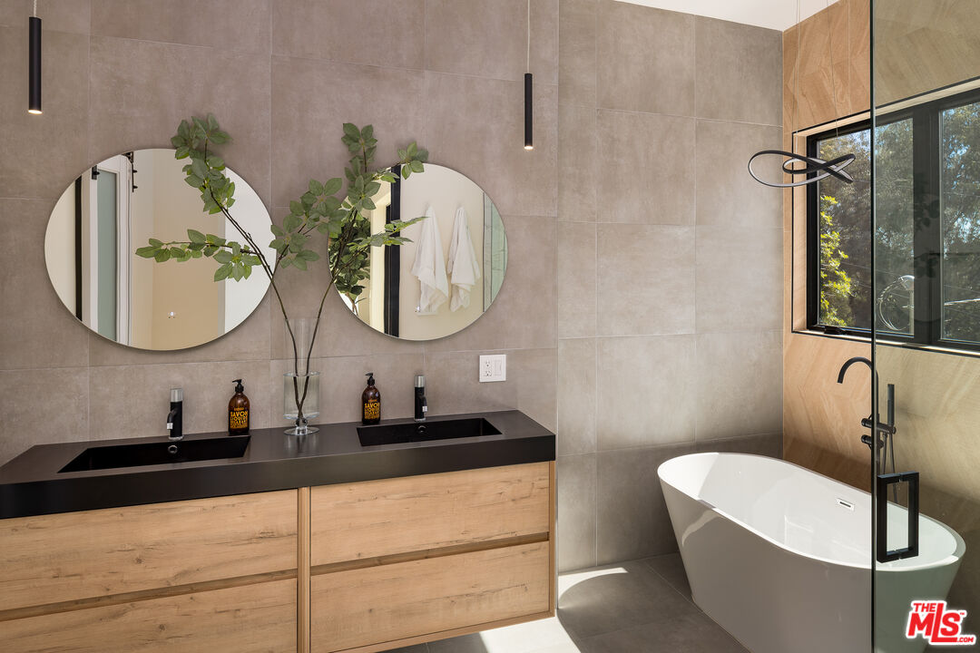 512 Rustic Drive Los Angeles, CA 90065 - Photo 34 of 53 a bathroom with a double vanity sink and a mirror