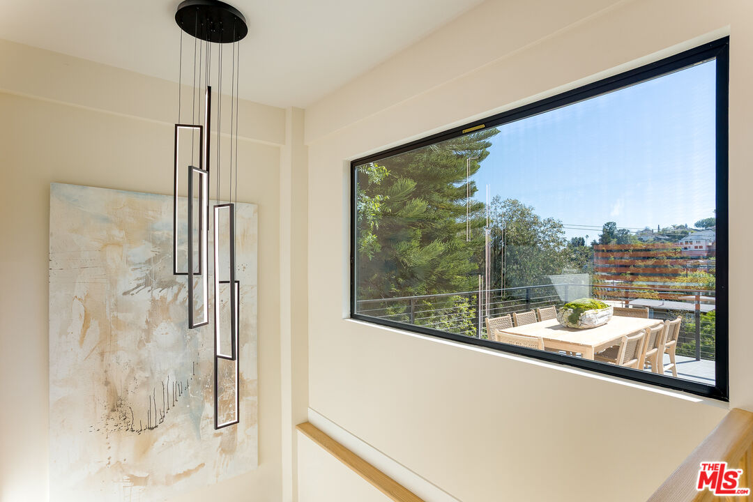 512 Rustic Drive Los Angeles, CA 90065 - Photo 39 of 53 a view of a room with a large window and wooden floor