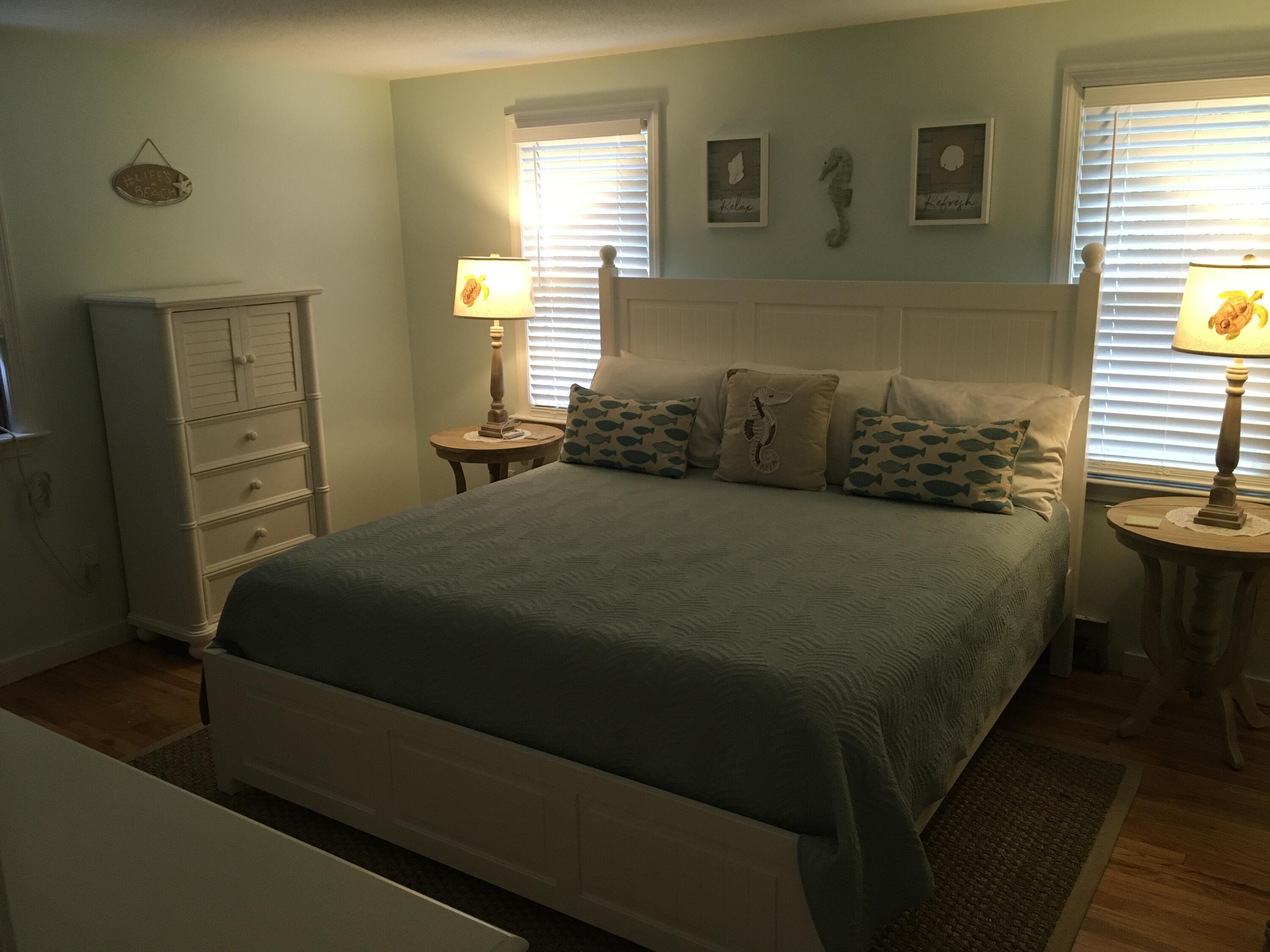 65 Kelley Road Hyannis, MA 02601 - Photo 13 of 38 a bed sitting in a bedroom next to a window