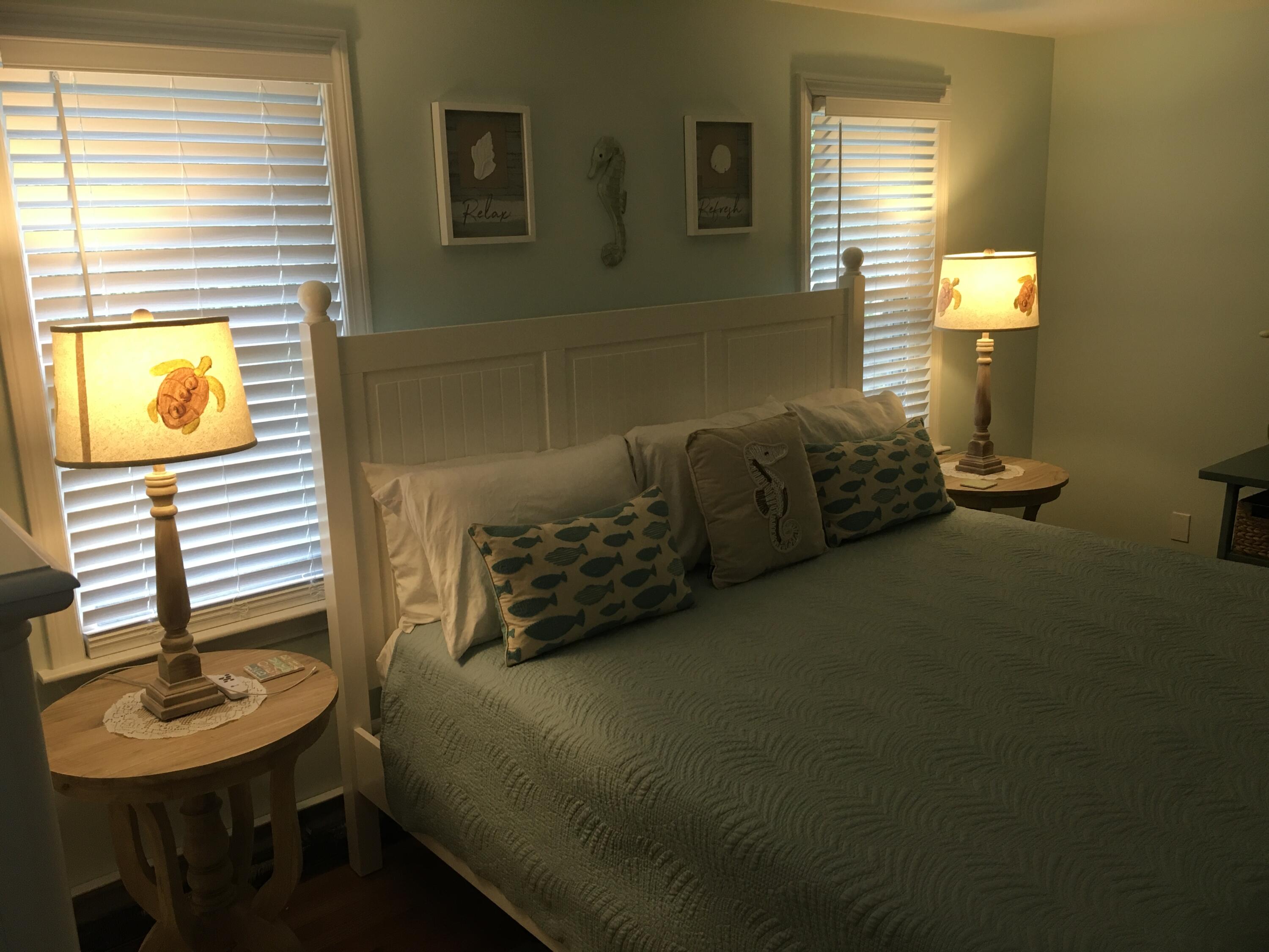 65 Kelley Road Hyannis, MA 02601 - Photo 16 of 38 a bedroom with a bed dresser and a chair