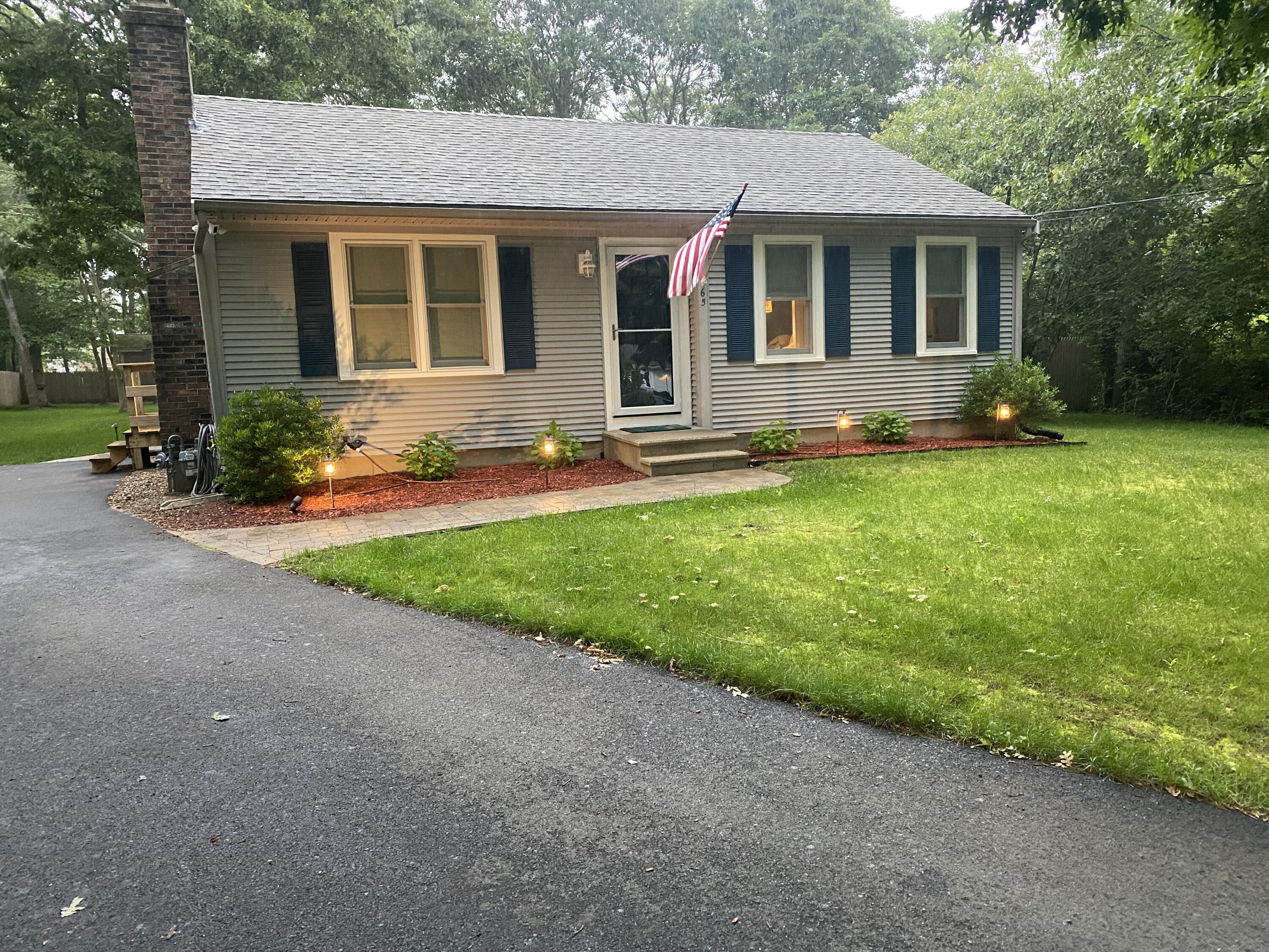 65 Kelley Road Hyannis, MA 02601 - Photo 2 of 38 front view of a house with a yard