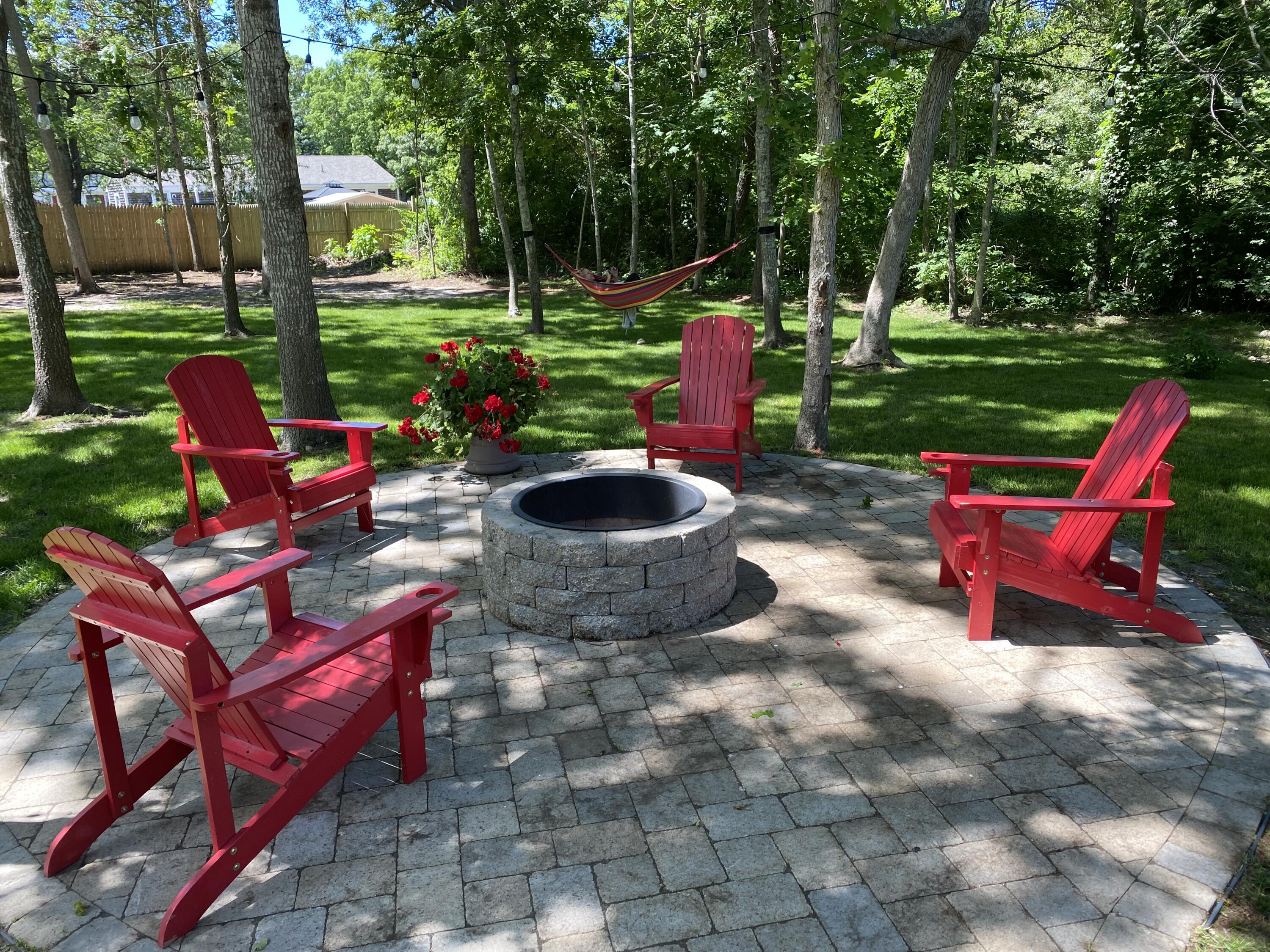 65 Kelley Road Hyannis, MA 02601 - Photo 21 of 38 a view of a yard with furniture and outdoor tub