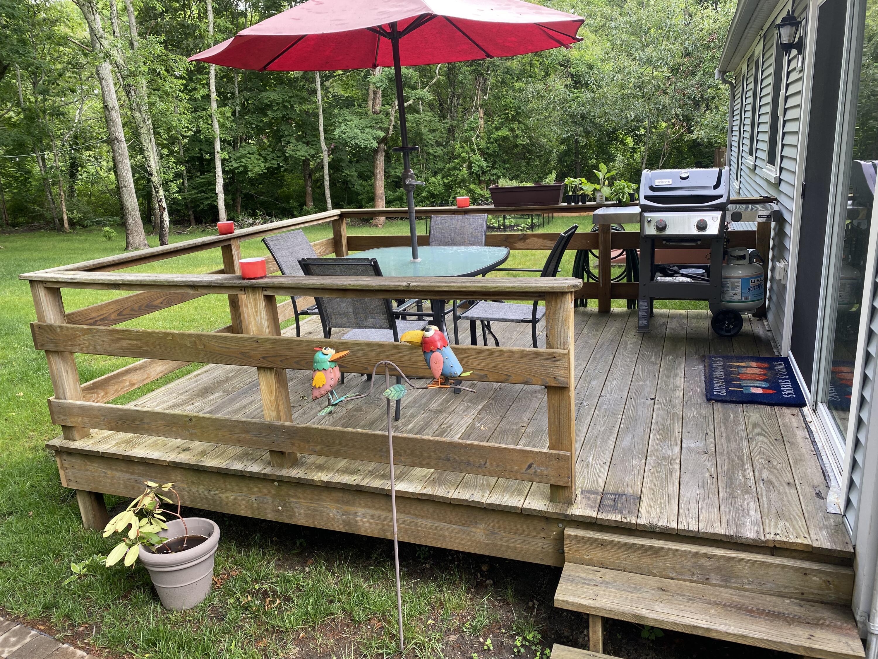 65 Kelley Road Hyannis, MA 02601 - Photo 22 of 38 a view of a backyard with sitting area and furniture