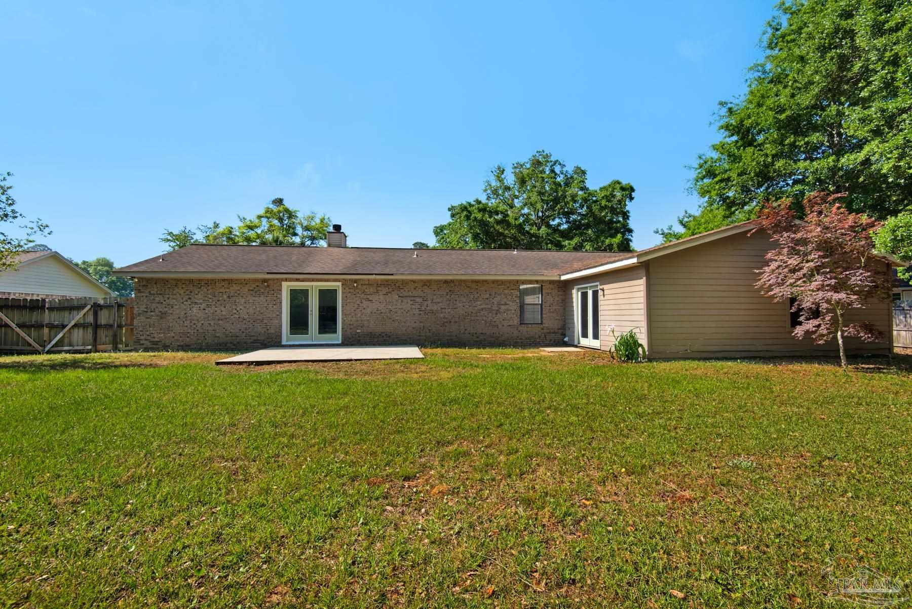 5804 Gulf Road Milton, FL 32583 - Photo 50 of 54 a front view of house with yard and trees