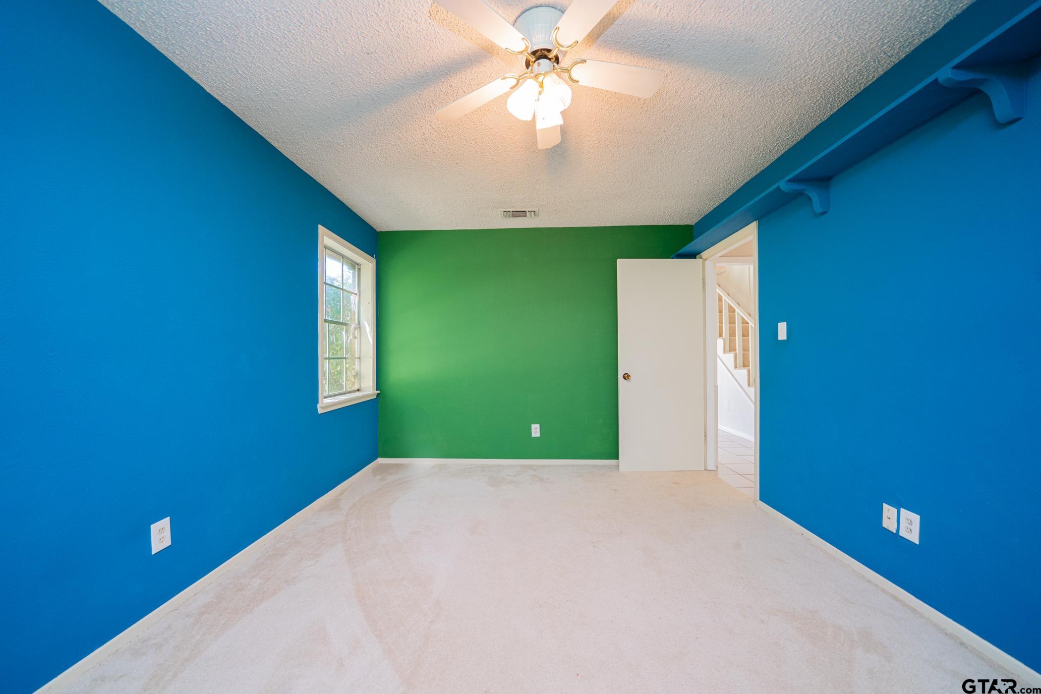 1332 Cr 4840 Mount Mount Pleasant, TX 75455 - Photo 18 of 38 a view of a big room with windows