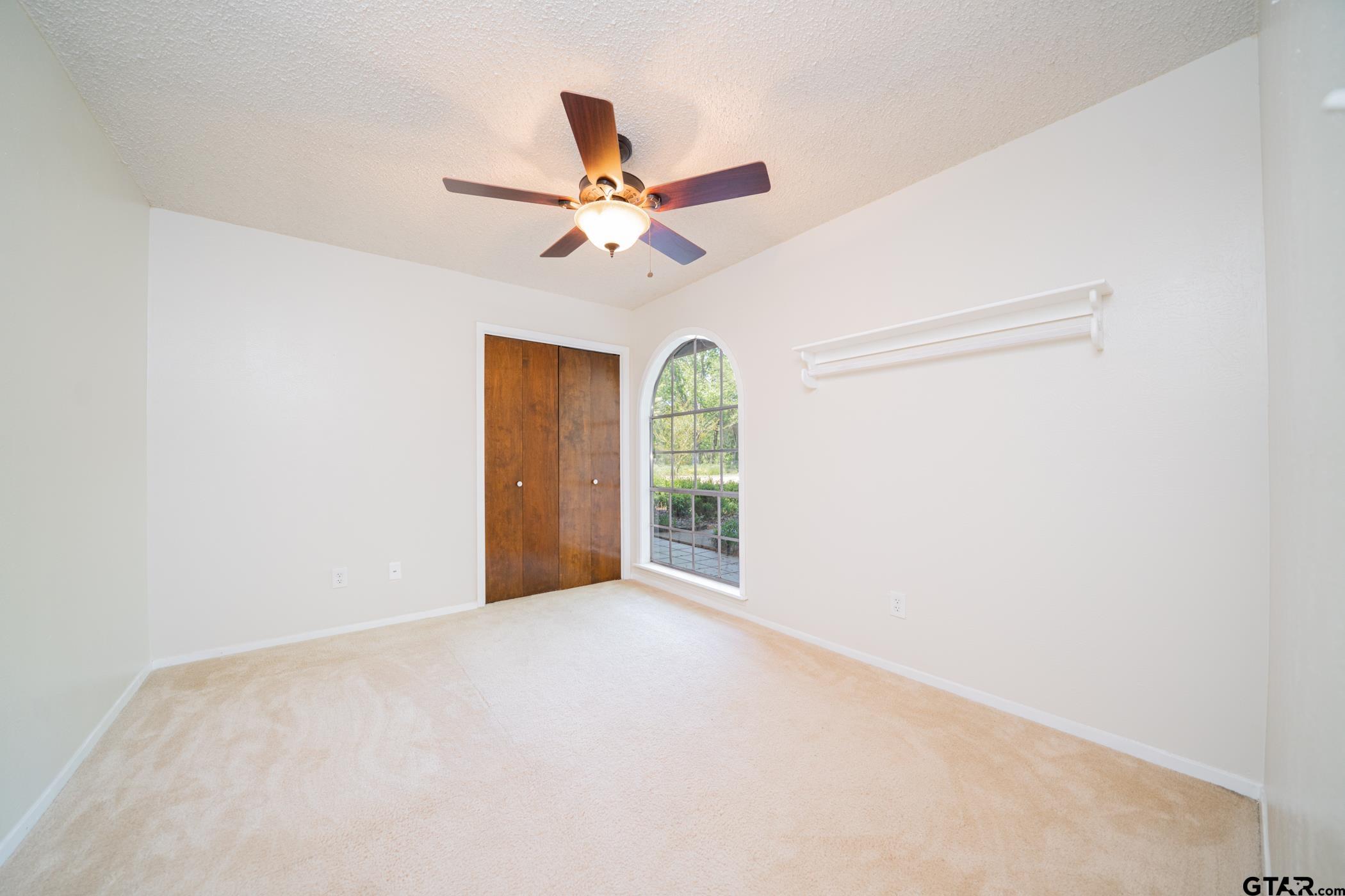 1332 Cr 4840 Mount Mount Pleasant, TX 75455 - Photo 21 of 38 a view of a big room with carpet