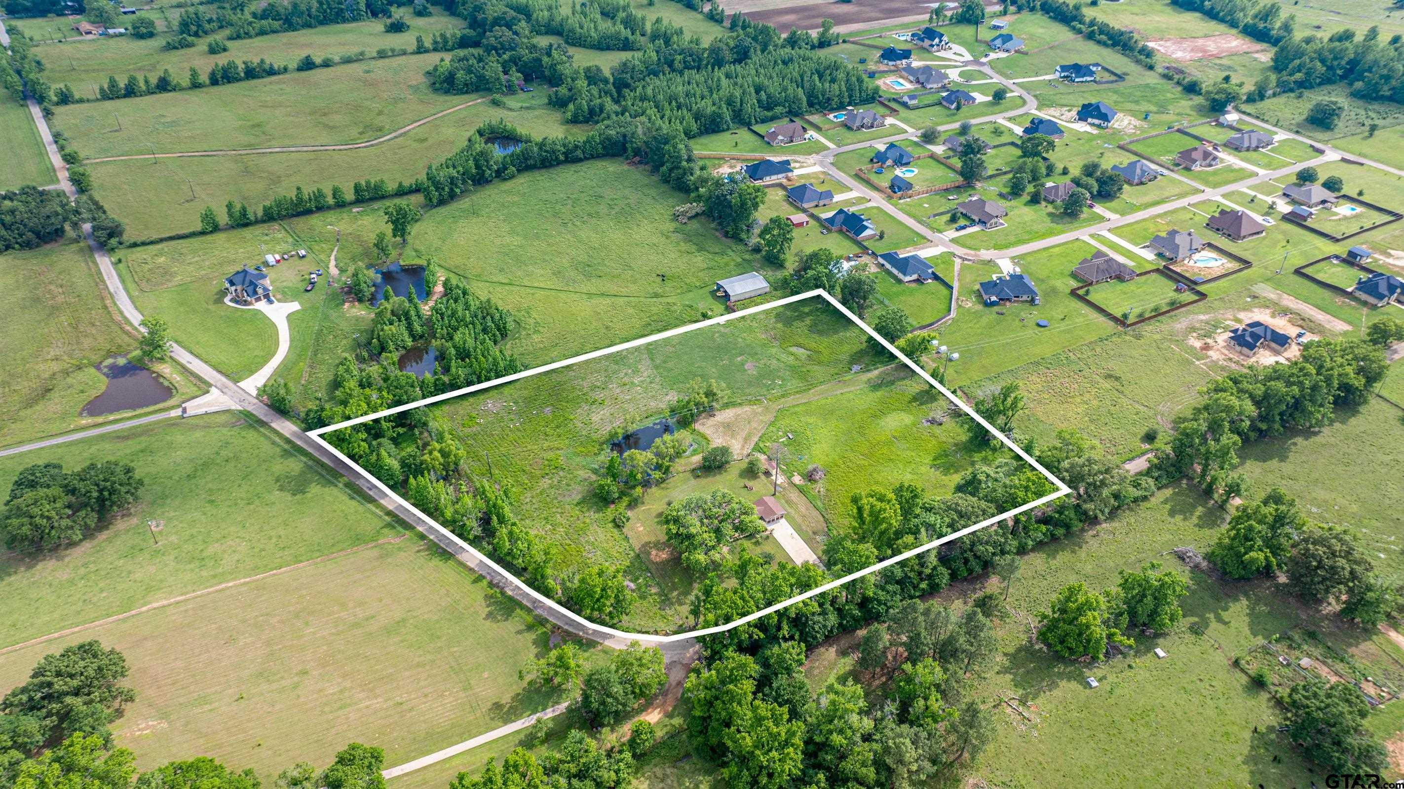 1332 Cr 4840 Mount Mount Pleasant, TX 75455 - Photo 38 of 38 an aerial view of a tennis court