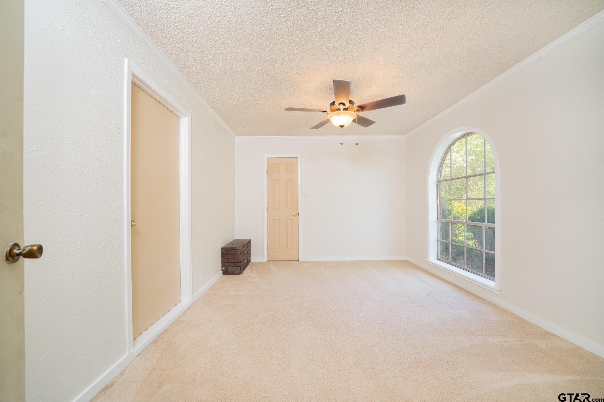 1332 Cr 4840 Mount Mount Pleasant, TX 75455 - Photo 4 of 38 a view of an empty room with a window