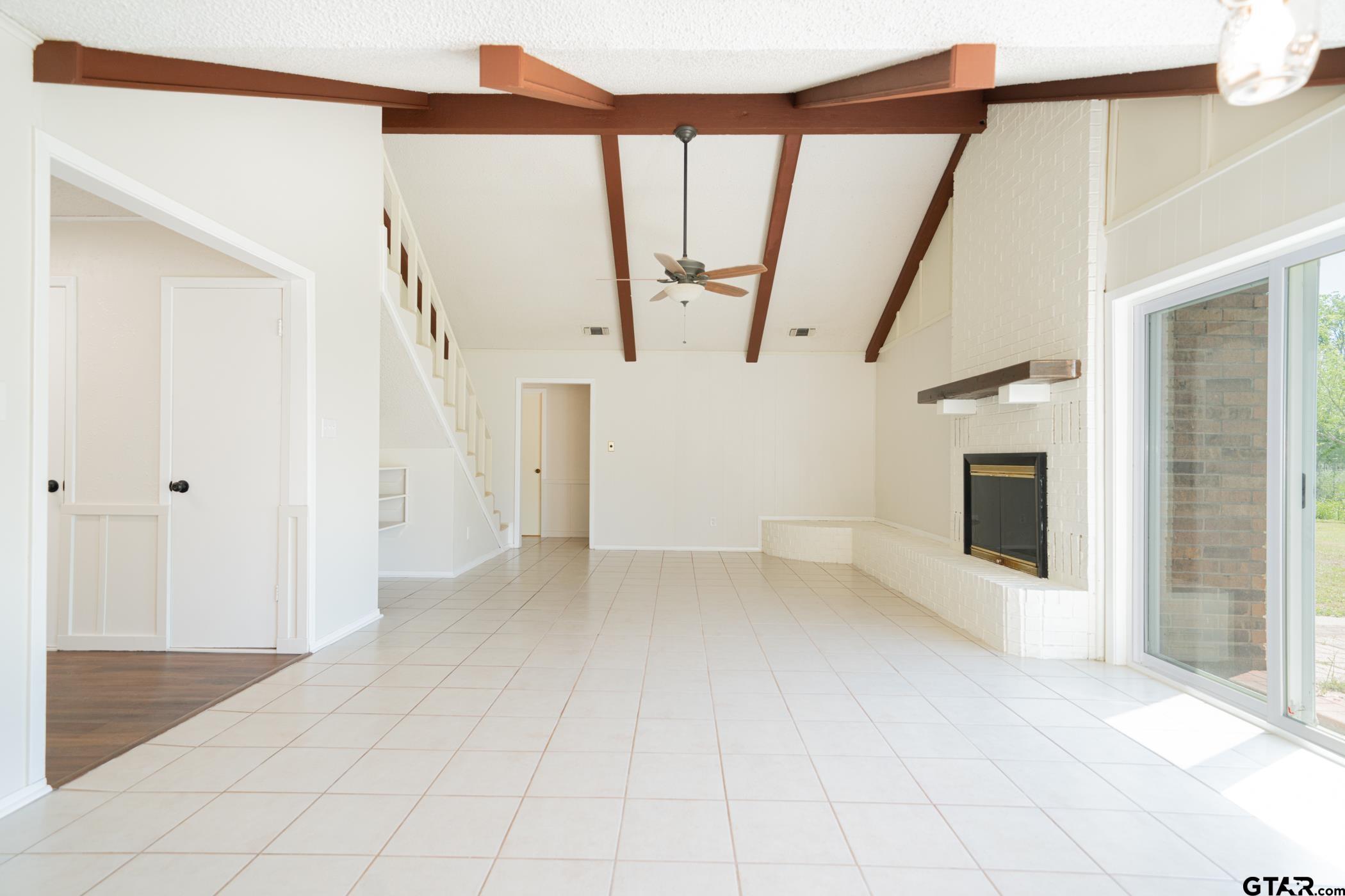 1332 Cr 4840 Mount Mount Pleasant, TX 75455 - Photo 8 of 38 a view of a hallway with wooden floor and entryway