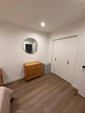 a view of a livingroom with wooden floor