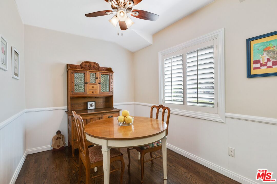 811 Jacon Way Pacific Palisades, CA 90272 - Photo 12 of 25 a view of a dining room with furniture and wooden floor