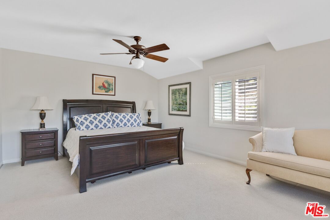 811 Jacon Way Pacific Palisades, CA 90272 - Photo 14 of 25 a living room with furniture and a fireplace