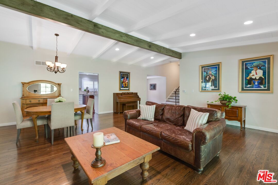 811 Jacon Way Pacific Palisades, CA 90272 - Photo 2 of 25 a living room with furniture fireplace and wooden floor