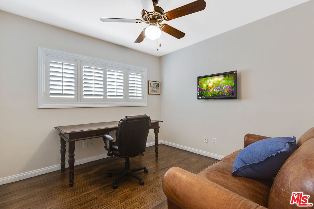 811 Jacon Way Pacific Palisades, CA 90272 - Photo 21 of 25 a living room with furniture and a window