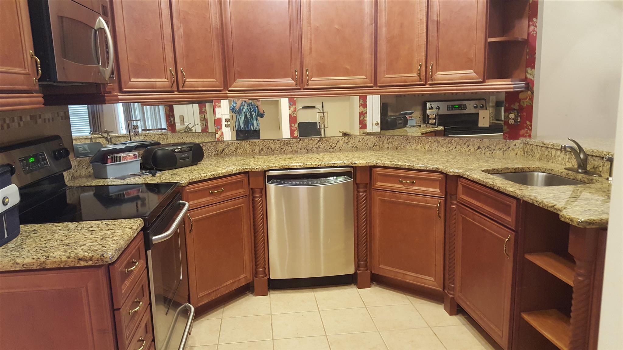 7118 Fernvale Road Fairview, TN 37062 - Photo 29 of 29 a kitchen with stainless steel appliances granite countertop a sink stove and cabinets