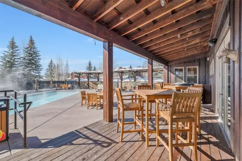 a bedroom with furniture and a flat screen tv