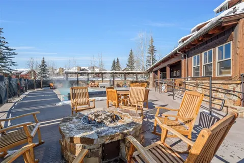 a view of a hallway with seating area