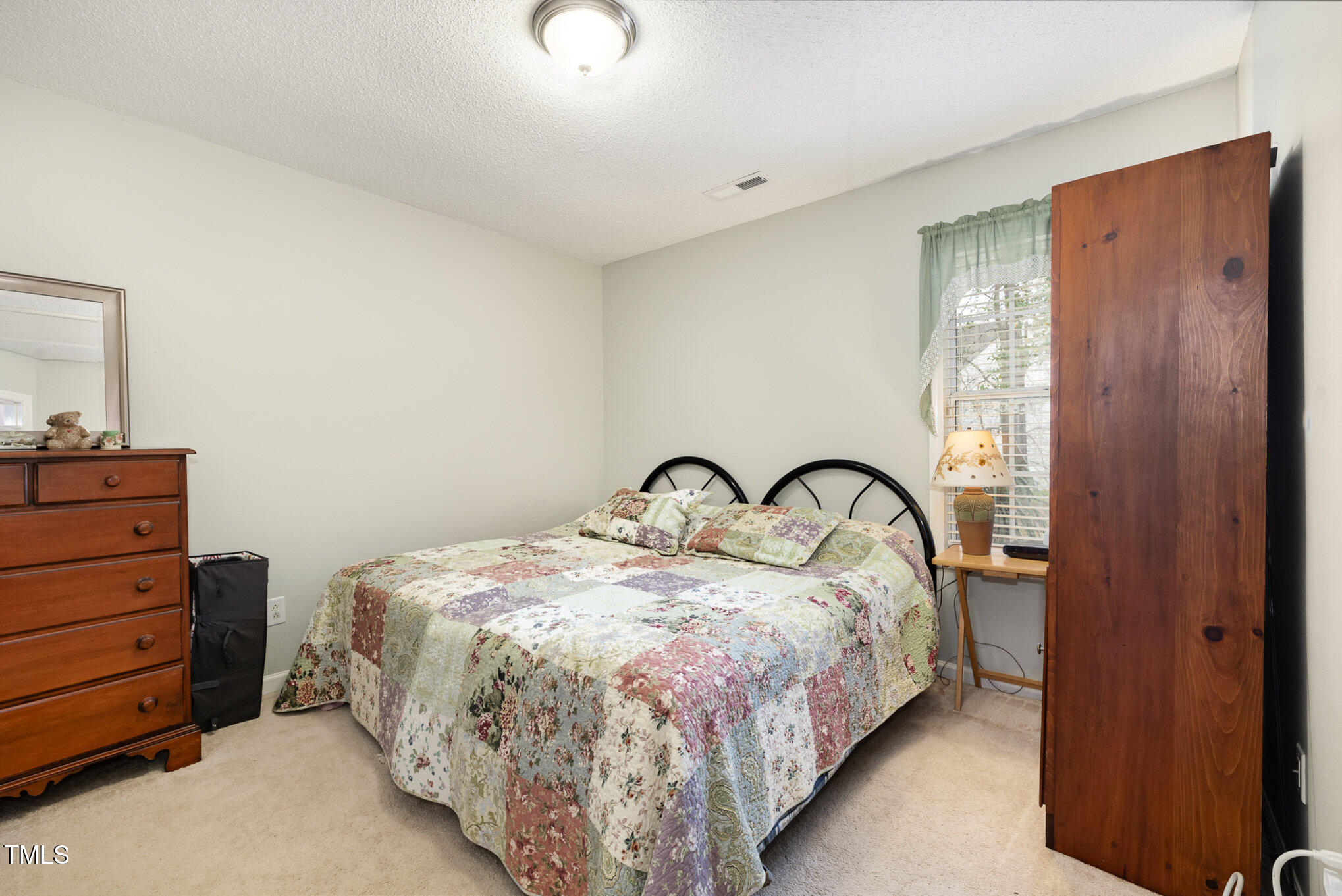 5557 Fieldcross Court Raleigh, NC 27610 - Photo 9 of 16 Second Bedroom
